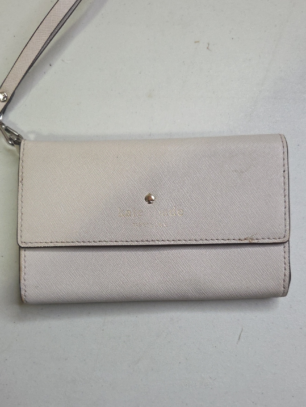 kate spade pale pink saffiano leather wristlet clutch with gold-tone stud